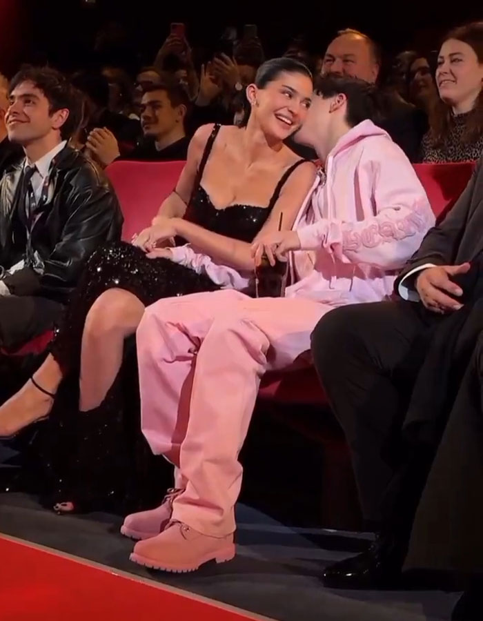 Timothée Chalamet and Kylie Jenner at a Valentine's Day event, capturing attention with their stylish outfits.